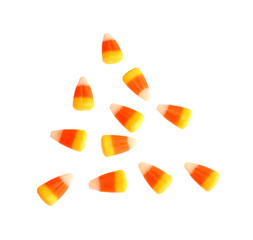 Colorful Halloween candy corns on white background