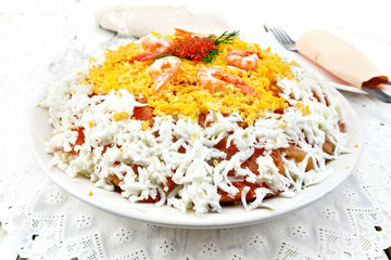 Salad of salmon and seafood on table