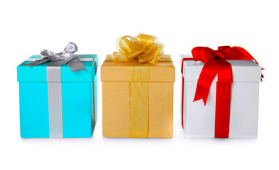 Set of beautiful gift boxes with wonderful bows of shiny ribbons on white background