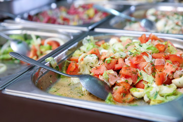 Steel self service trays filled with delicious food