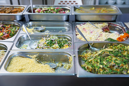 Steel self service trays filled with delicious food