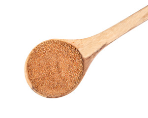 Wooden spoon of coconut sugar on white background