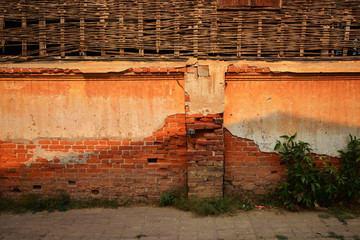Old house with brick wall for background