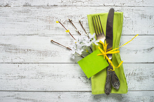 Spring Table setting at white wooden table.