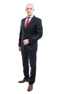 Full body senior business man standing being serious