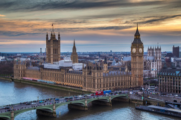 Fototapeta London, England - The famous Big Ben with Houses of Parliament and Westminster Bridge at sunset obraz