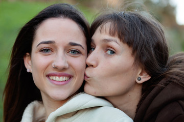 Nice sisters in a park