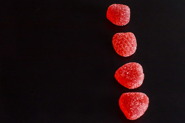 .Bright tasty marmalade on a white background