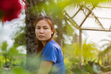 sad woman on the background of an the park