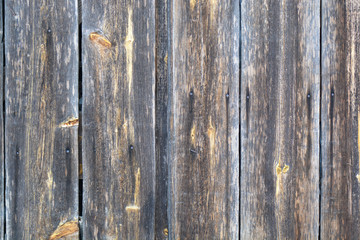old wood background texture. Vintage wooden background with knots and nail holes.