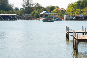 Small wooden harbor on river.
