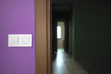 Switch next to the doorway