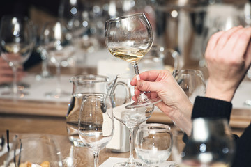 people consider the color of the wine and try how it smells in different glasses