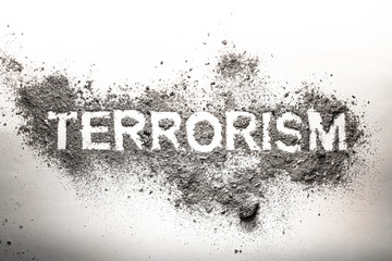 Terrorism word written in ash, dust, dirt as awful, dangerous, frightening, foreboding concept image