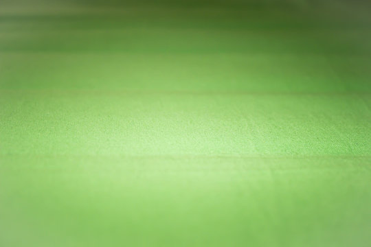 Green Blurry Fabric Background