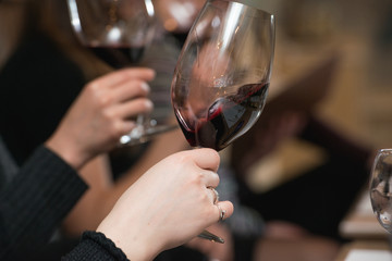 people consider the color of the wine and try how it smells in different glasses