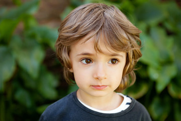Portrait of a small child in the field