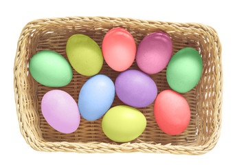 Colorful Easter Eggs in basket on white background with clipping path