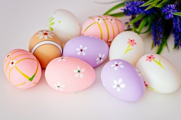 Easter card, spring decoration with blue flowers and eggs.