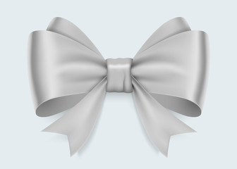 Realistic white bow isolated on white background.