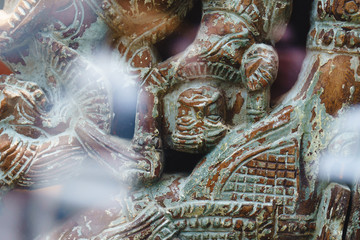 ancient statues of wild tribes. decorations of wood