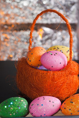 Decorative Easter eggs in a basket,