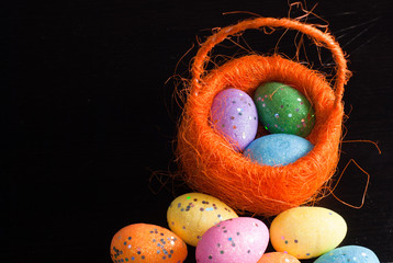 Decorative Easter eggs in a basket,