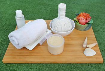 Spa herbal compressing ball with towels and Salt Scrub, Spa concept background