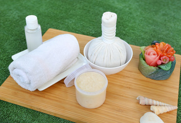 Spa herbal compressing ball with towels and Salt Scrub, Spa concept background