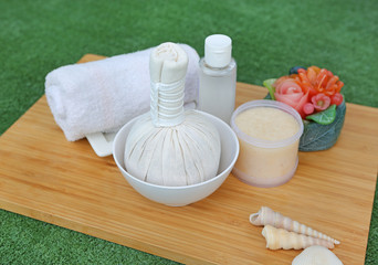 Spa herbal compressing ball with towels and Salt Scrub, Spa concept background