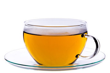 Cup of green chinese gunpowder tea on saucer, clipping path included.