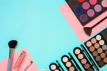 The women's cosmetics set on a blue background, modern woman.