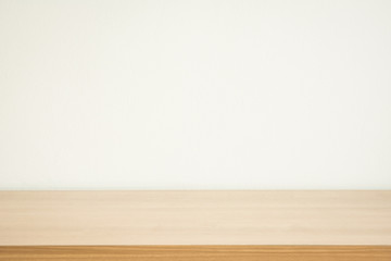 wooden table white wall background
