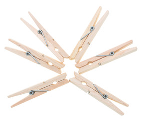 Wooden clothespins on a white background