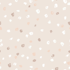 Seamless beige ink dots pattern. Vector grunge background. Vector illustration.
