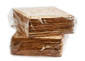 two packs of matzo in a transparent  package for Pesach, isolated on a white background