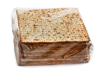 Matzo in a transparent  package for Pesach, isolated on a white background