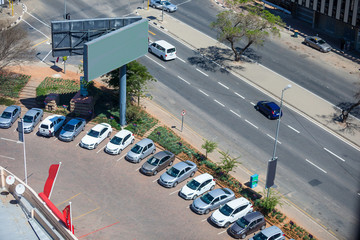 Cars parked next to the road, Sandton, Johannesburg.