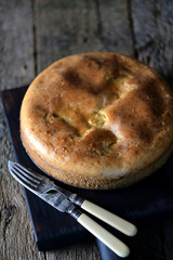 Snack cake with sauerkraut and mushrooms. Rustic style.