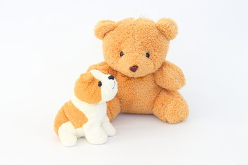 Teddy Bear and brown dog dolls, brown ears on a white background.