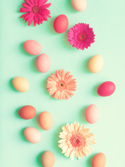 Fototapeta na wymiar Vintage candy colored Easter eggs over mint background
