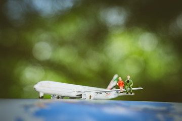 Miniature people lover on journey