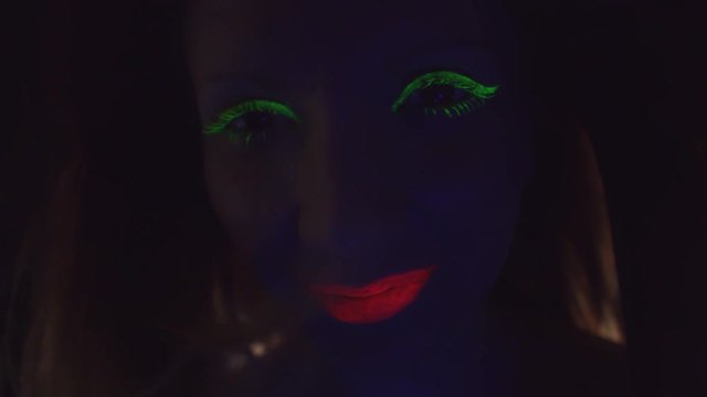 4K Disco Glow Neon Make-up Woman Smiling Face