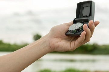 young traveller woman walking along country road.