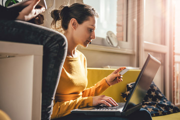 Woman using credit card