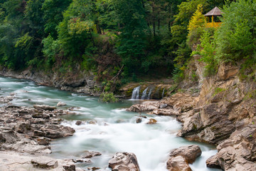 Fototapeta na wymiar Mountain river Belaya and waterfall, long exposure