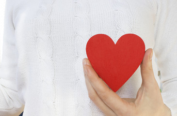 Red heart on a white sweater