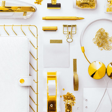 Grid Flatlay Scene, White Planner And Gold Stationery Accessories, On A White Desk Background