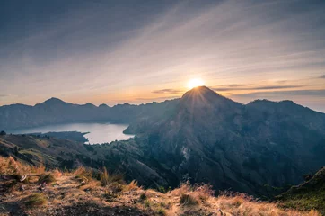 Tuinposter Mount Rinjani basecamp. The mountain is the second highest volcano in Indonesia and rises to 3,726 metres (12,224 ft). © zhnger