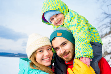 Family on a winter lake